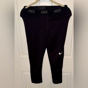 Nike Women's Black Capris with White Swoosh Logo